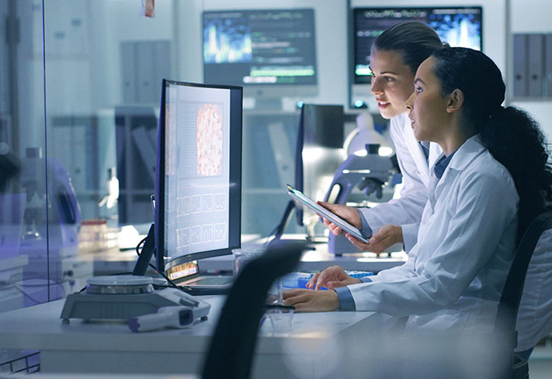 2 lab technicians working